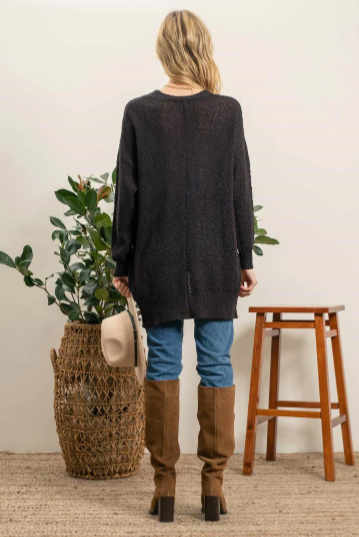 Meet Lizzy – the lightweight, pocket-equipped cardigan designed to keep you warm with style. She's an undercover superhero of sorts, blending effortlessly into any wardrobe and helping you save the day whenever the temperature drops! Perfect for those days when you need an extra layer but don't want the bulk.