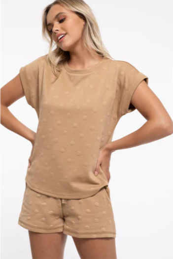 Stay chic and comfy in this adorable lounge set with swiss dots! These cute shorts and short sleeves will have you lounging in style (in a jiffy!). Whether you’re working from home or just kicking back, you’ll be the queen of the living room!