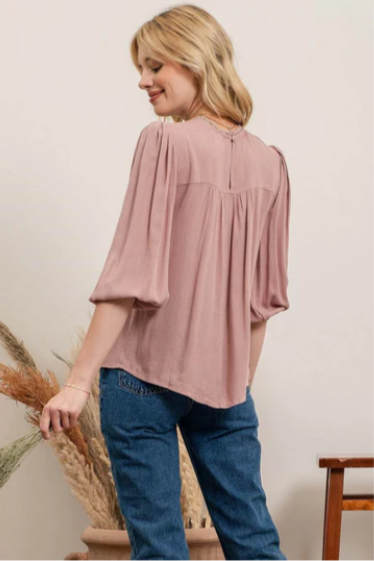 Rock your look with this ravishing top that'll take your fashion to the next level! With its elegant lace mock neck, stylish back-button closure with keyhole, and oh-so-pretty front lace inset and pleated bubble sleeves, you'll be sure to draw admiring glances wherever you go. Let's get fabulous!