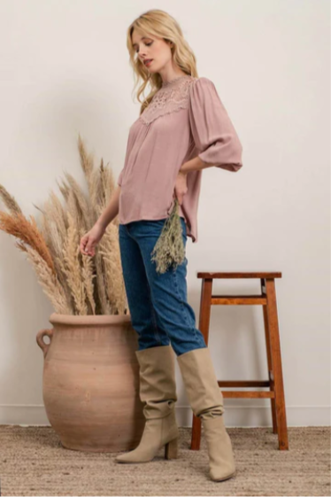 Rock your look with this ravishing top that'll take your fashion to the next level! With its elegant lace mock neck, stylish back-button closure with keyhole, and oh-so-pretty front lace inset and pleated bubble sleeves, you'll be sure to draw admiring glances wherever you go. Let's get fabulous!
