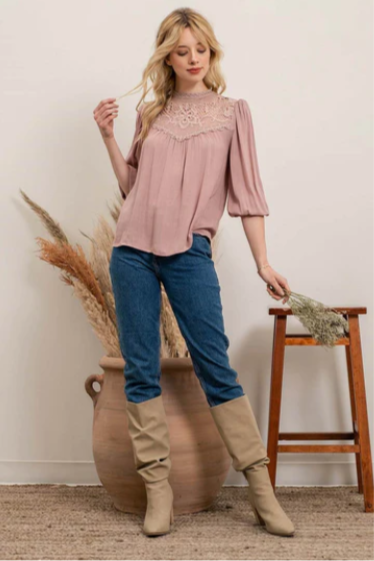 Rock your look with this ravishing top that'll take your fashion to the next level! With its elegant lace mock neck, stylish back-button closure with keyhole, and oh-so-pretty front lace inset and pleated bubble sleeves, you'll be sure to draw admiring glances wherever you go. Let's get fabulous!