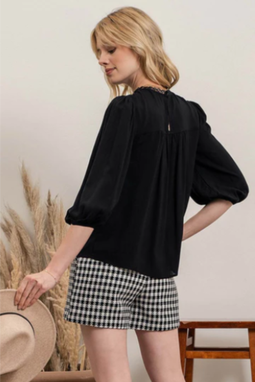 Rock your look with this ravishing top that'll take your fashion to the next level! With its elegant lace mock neck, stylish back-button closure with keyhole, and oh-so-pretty front lace inset and pleated bubble sleeves, you'll be sure to draw admiring glances wherever you go. Let's get fabulous!