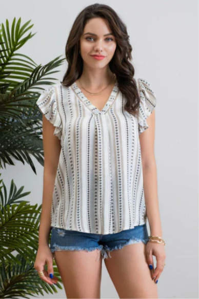Be cool and breezy with this chambray-inspired Cindy Ivory & Blue Patterned Top! Its v-neckline and short ruffle sleeves with lace trim give it a sweet and sassy look. The back yoke and non-functional buttons round out the look, with a subtle hint of western-style flair. Yee-haw!!