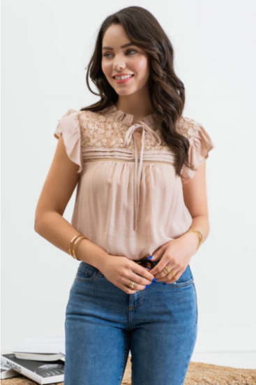 Freshen up your wardrobe with the "Faith Light Mocha" top! With split neckline, flutter sleeves, and lace detail, this top is perfect for any occasion. And tie it with a cute neck tie for an extra WOW factor. Be bold, be beautiful, and stay full of faith!