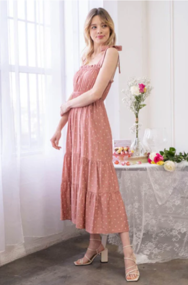 Look oh-so-stylish in this "Lily Terracotta Polka Dot" midi dress! With its square neckline, sleeveless design and tie straps, this dress is everything your summer wardrobe needs. The midi length and tiers give you the perfect shape for any occasion. Let the fun begin!
