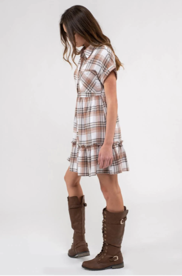 Rock your modern-meets-rustic side in this plaid mini dress! Featuring a collared neckline with button down closure, cinched waist, and a ruffle hem, you'll look fly af (as fashionable) no matter the occasion. With pocket detail, this pleated plaid piece will have you looking cute and stylish all day - yesssss girl! Sizes small through large.