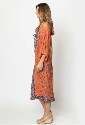 Look downright gorgeous in this "Floral Terracotta Lace Kimono"! A delightful floral pattern, tie front, and flowy sleeves combine to create a style that's both flirty and fashionable. Get ready to make a statement - no matter what the occasion! One sizes fits most.