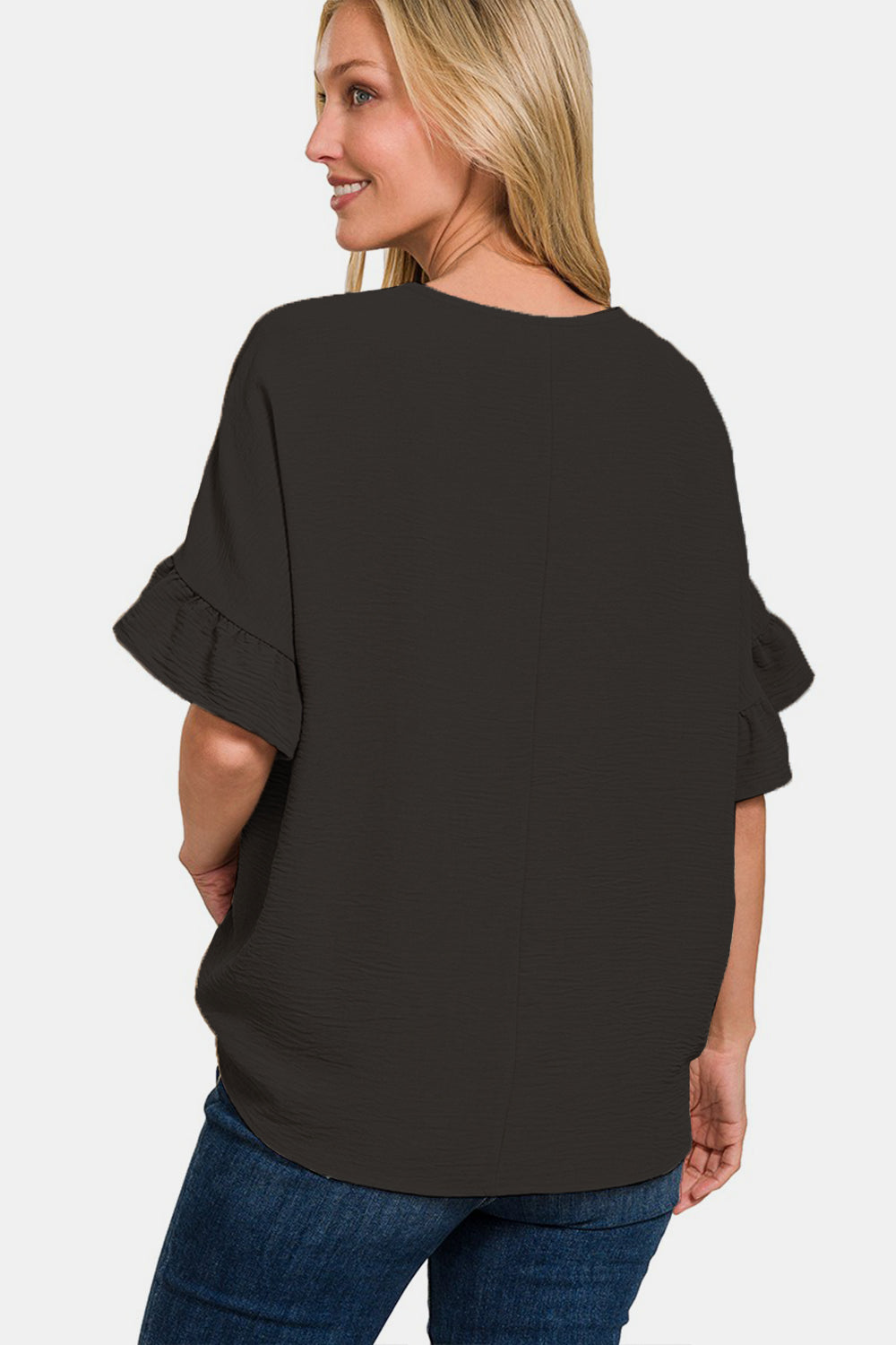 This V-Neck Flutter Sleeve Top is a versatile and feminine addition to your wardrobe. The V-neckline adds a flattering touch to the design. The flutter sleeves give a soft and romantic feel to this top. Perfect for both casual and dressy occasions, this top can be dressed up or down effortlessly. Pair it with jeans for a casual look or with a skirt for a more polished outfit.  S-XL