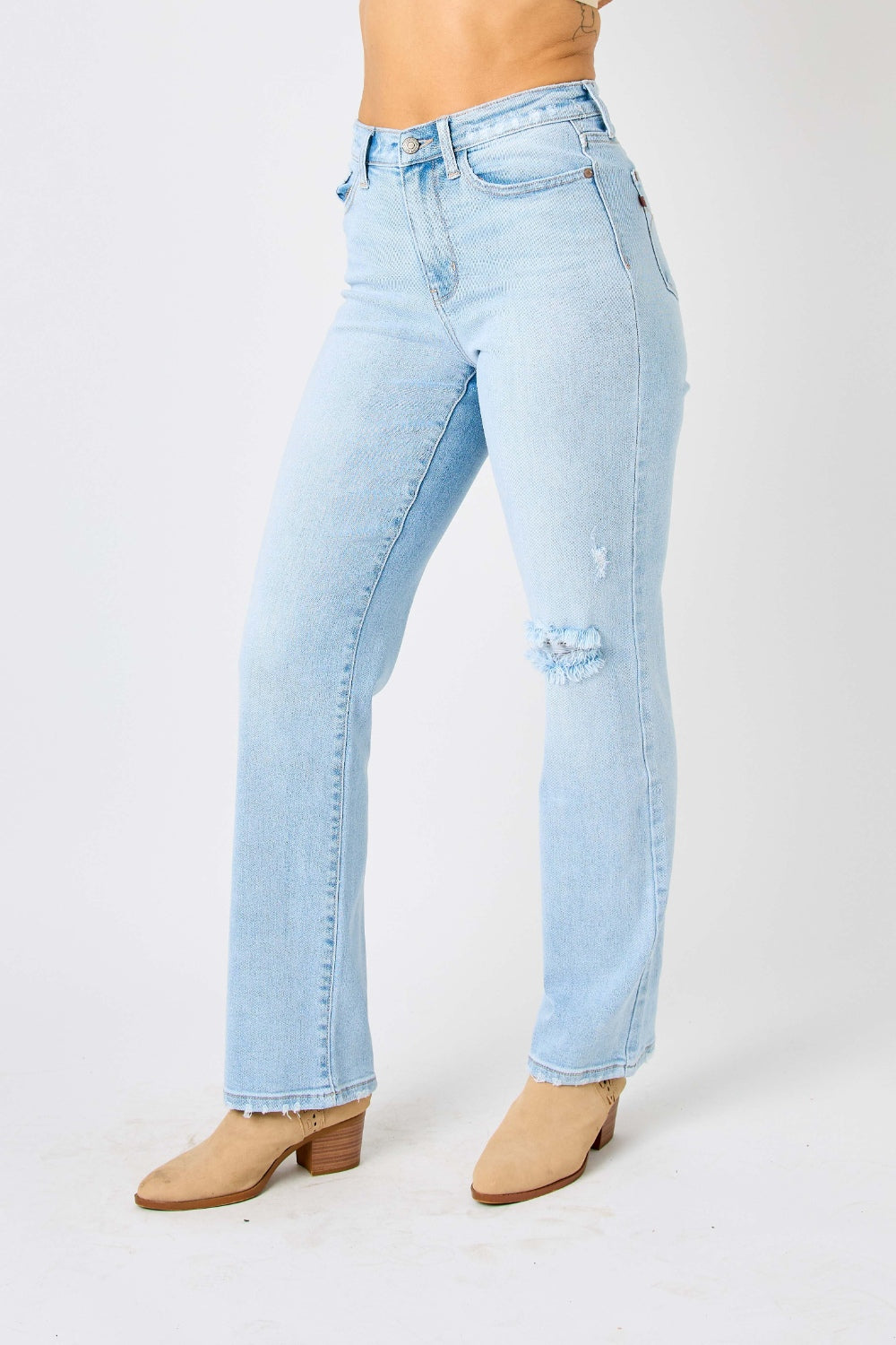 These high waist distressed straight jeans are a must-have. Their flattering cut accentuates your curves while the distressed details add an edgy vibe. Made with high-quality denim, they are both comfortable and durable. The high waist design also helps to cinch in your waist and create a slimming effect 0 -24W
