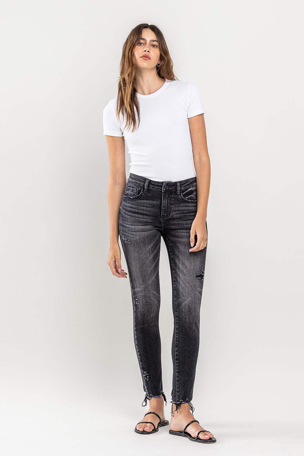 These raw hem cropped skinny jeans are a must-have for any fashion-forward individual. The raw hem adds a touch of edge to the classic skinny jeans silhouette. The cropped length is perfect for showcasing your favorite footwear.