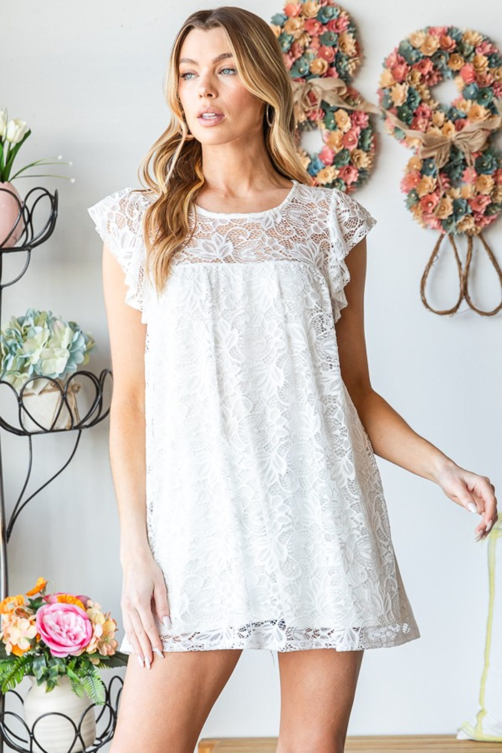 This round neck cap sleeve lace top is elegant and feminine, perfect for any occasion. The delicate lace detailing adds a touch of sophistication, while the cap sleeves provide a flattering and comfortable fit. S - 3X