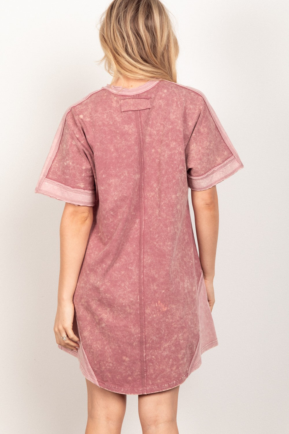 The short sleeve V-neck tee dress is a versatile and comfortable piece that effortlessly combines casual style with a touch of elegance. With its classic V-neckline and relaxed fit, this dress is perfect for everyday wear or dressing up for various occasions. The short sleeves provide a laid-back feel while offering breathability for warmer days. S-L