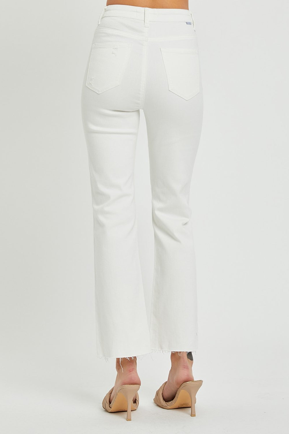 These high rise button fly straight ankle jeans are a stylish and on-trend choice for your everyday wardrobe. The high rise design creates a flattering and elongated silhouette. The button fly adds a touch of vintage charm and detail to the jeans. The straight leg cut offers a classic and versatile look that can be dressed up or down.  0-3X