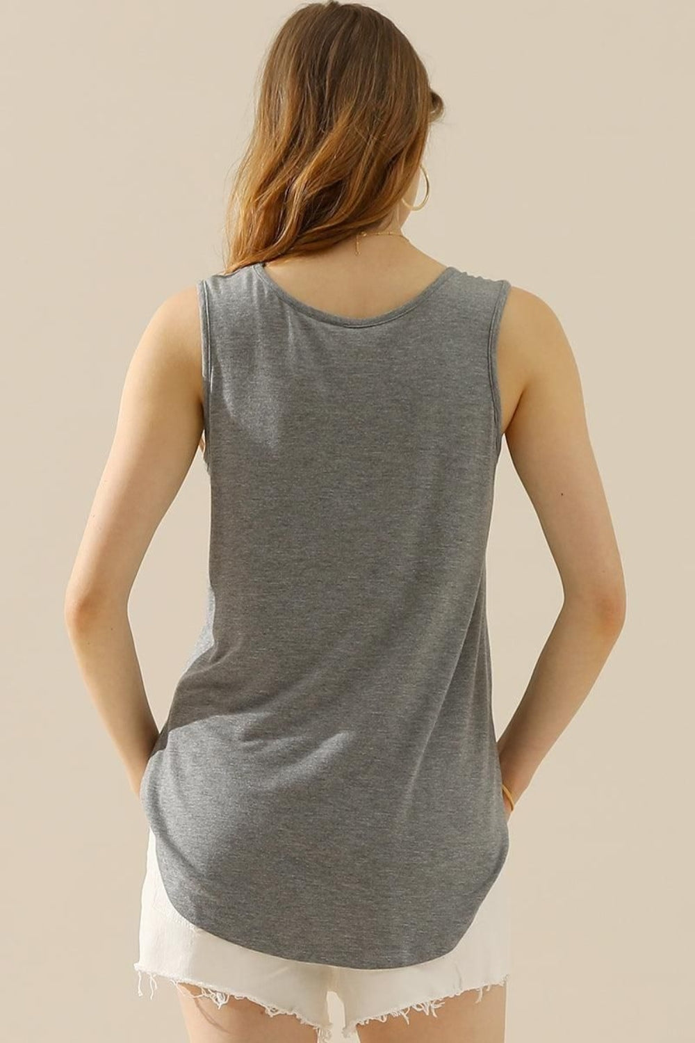 The V-Neck Curved Hem Tank is a stylish and versatile piece. With its flattering neckline and curved hem, it adds a touch of femininity to any outfit. The tank's relaxed fit provides comfort without sacrificing style. S -3X