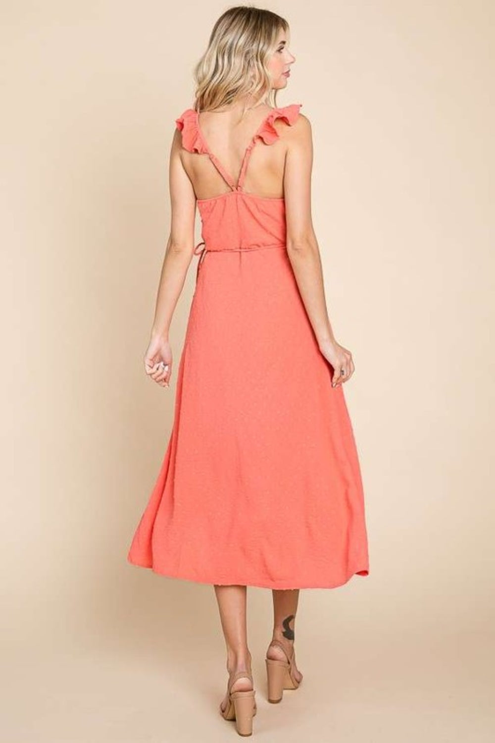 The Ruffle Detail Surplice Wrap Slip Dress is a stunning and versatile piece that exudes femininity and charm. With its delicate ruffle detailing and flattering wrap silhouette, this dress is perfect for any special occasion or evening event.  S-XL