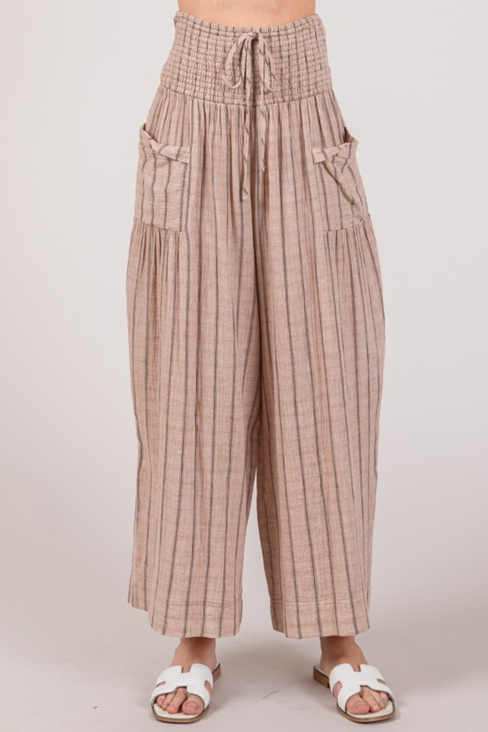 The Cotton Gauze Wash Stripe Pants are a comfortable and stylish choice for a casual and laid-back look. These pants feature a breathable cotton gauze fabric with a washed stripe pattern, adding a touch of texture and interest to your outfit.