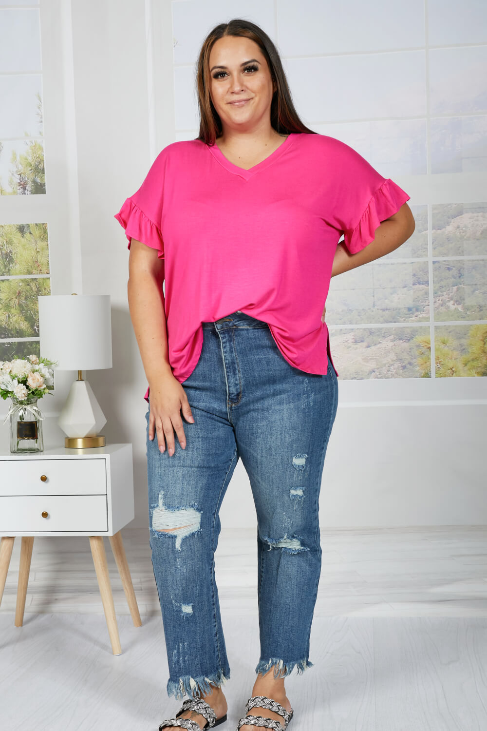 These straight leg jeans really amplify the "undone" look that you're trying to achieve. Not only do these jeans have distressing details throughout the body of the jeans, and at the hem, but also at the waist! To emphasize that unique feature, wear these jeans with a crop top. These are a medium wash. Sizes 5-11.
