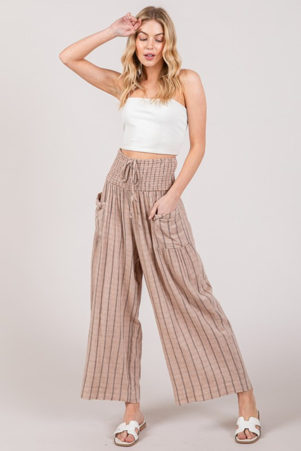 The Cotton Gauze Wash Stripe Pants are a comfortable and stylish choice for a casual and laid-back look. These pants feature a breathable cotton gauze fabric with a washed stripe pattern, adding a touch of texture and interest to your outfit.