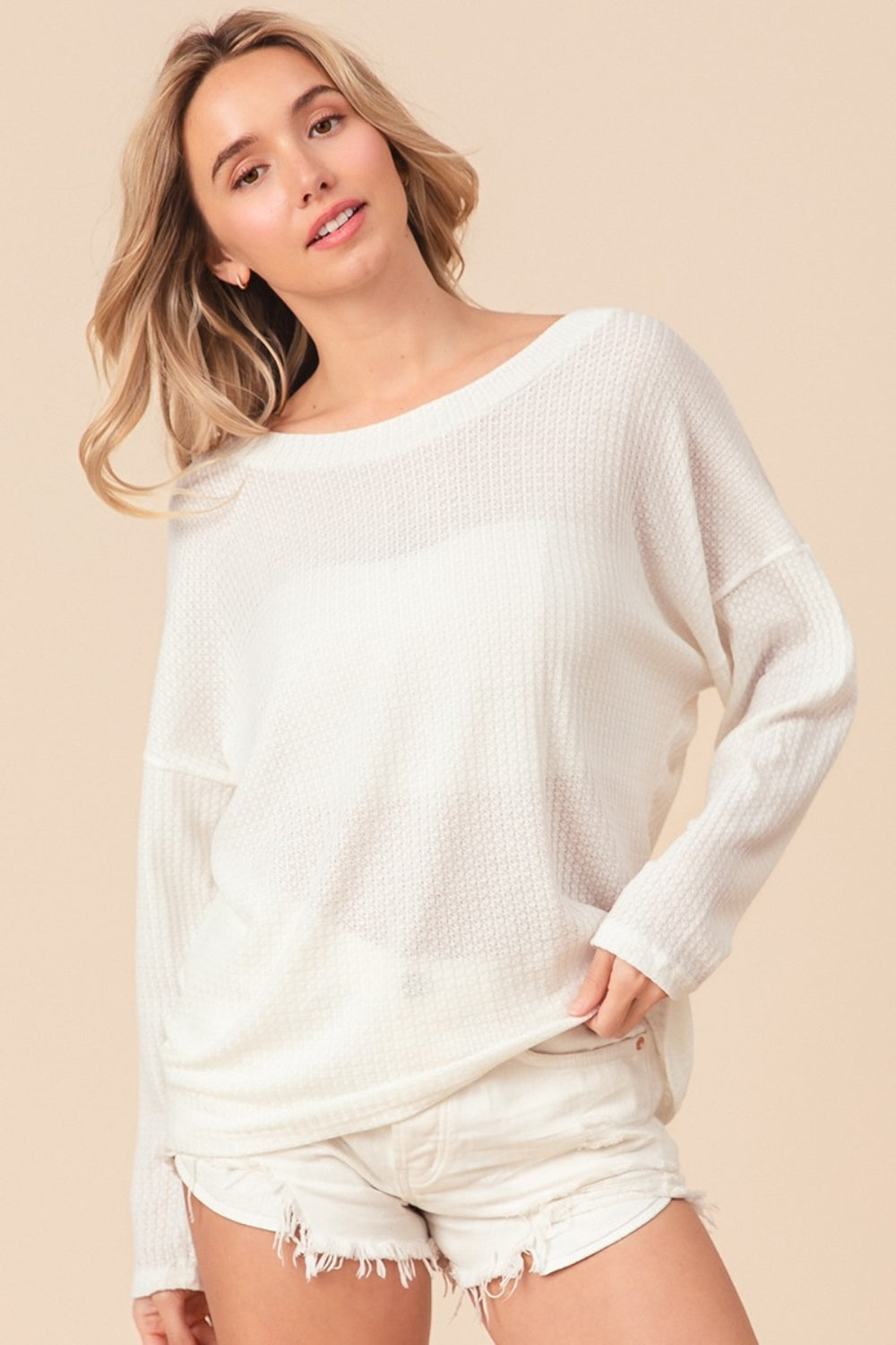 The Waffled Backless Drawstring Top is a flirty and stylish choice for your summer wardrobe. Featuring a waffled texture, this top adds depth and interest to your look. The backless design with a drawstring detail creates a playful and alluring silhouette. S - XL