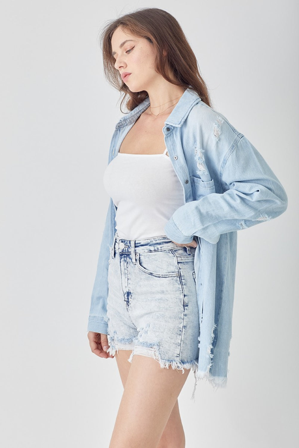 Raw Hem Distressed High Rise Denim Shorts are a trendy and versatile addition to any wardrobe. With their high rise fit and distressed detailing, these shorts offer a stylish and edgy look. The raw hem adds a touch of casual charm, making them perfect for everyday wear or dressing up for a night out. S-XL