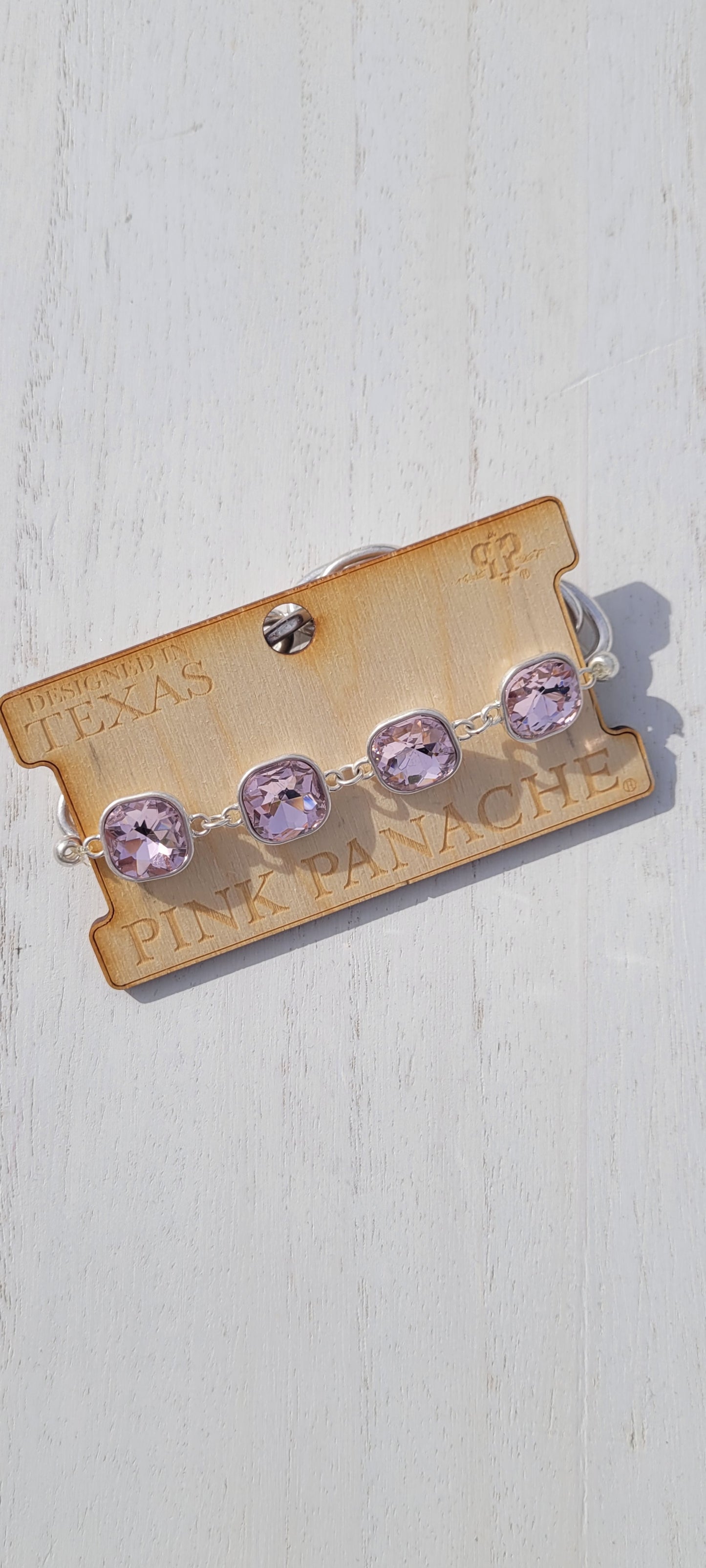 Pink Panache: Sadie Pink Panache bracelet Color: Light pink square rhinestone and silver chain stretch bracelet Limited supply! Keywords: Bracelet, Jewelry