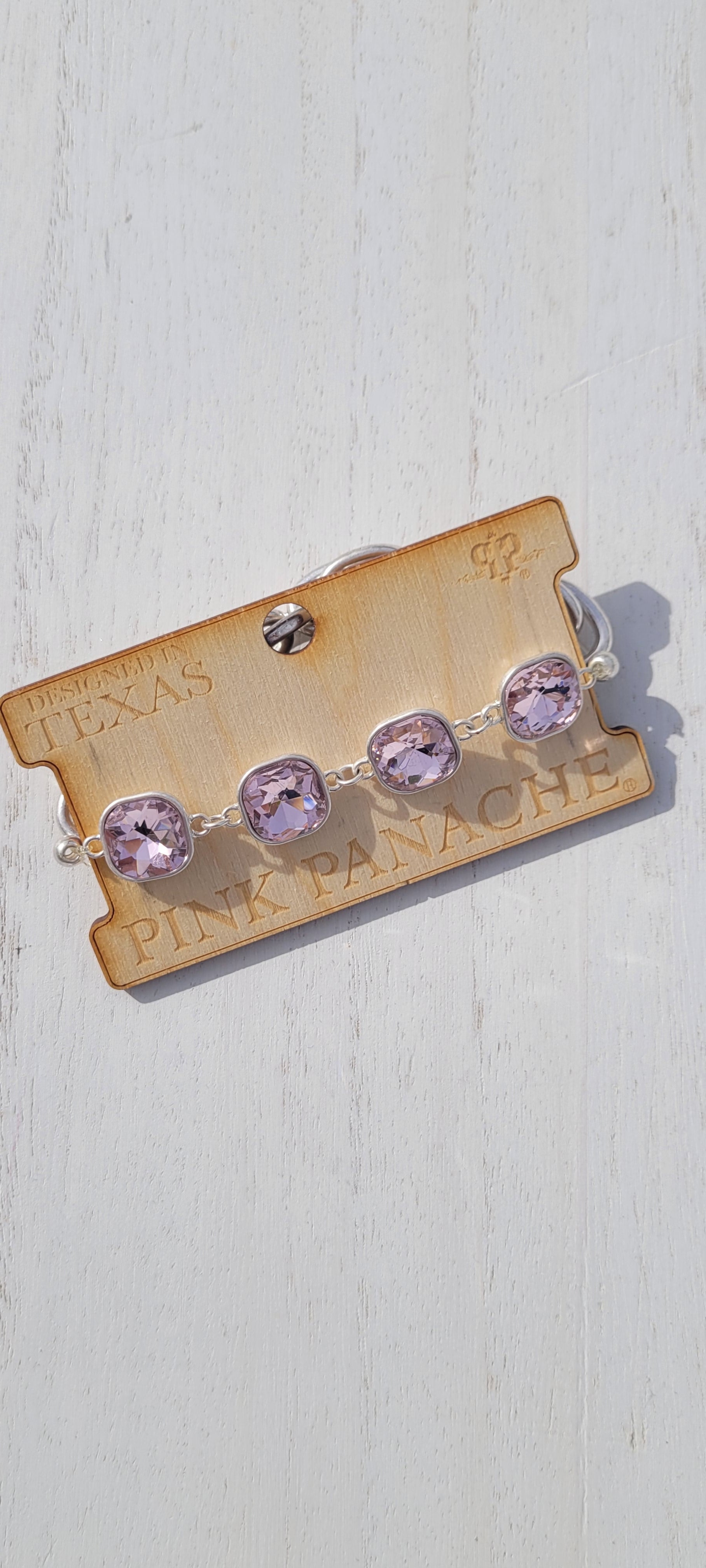 Pink Panache: Sadie Pink Panache bracelet Color: Light pink square rhinestone and silver chain stretch bracelet Limited supply! Keywords: Bracelet, Jewelry