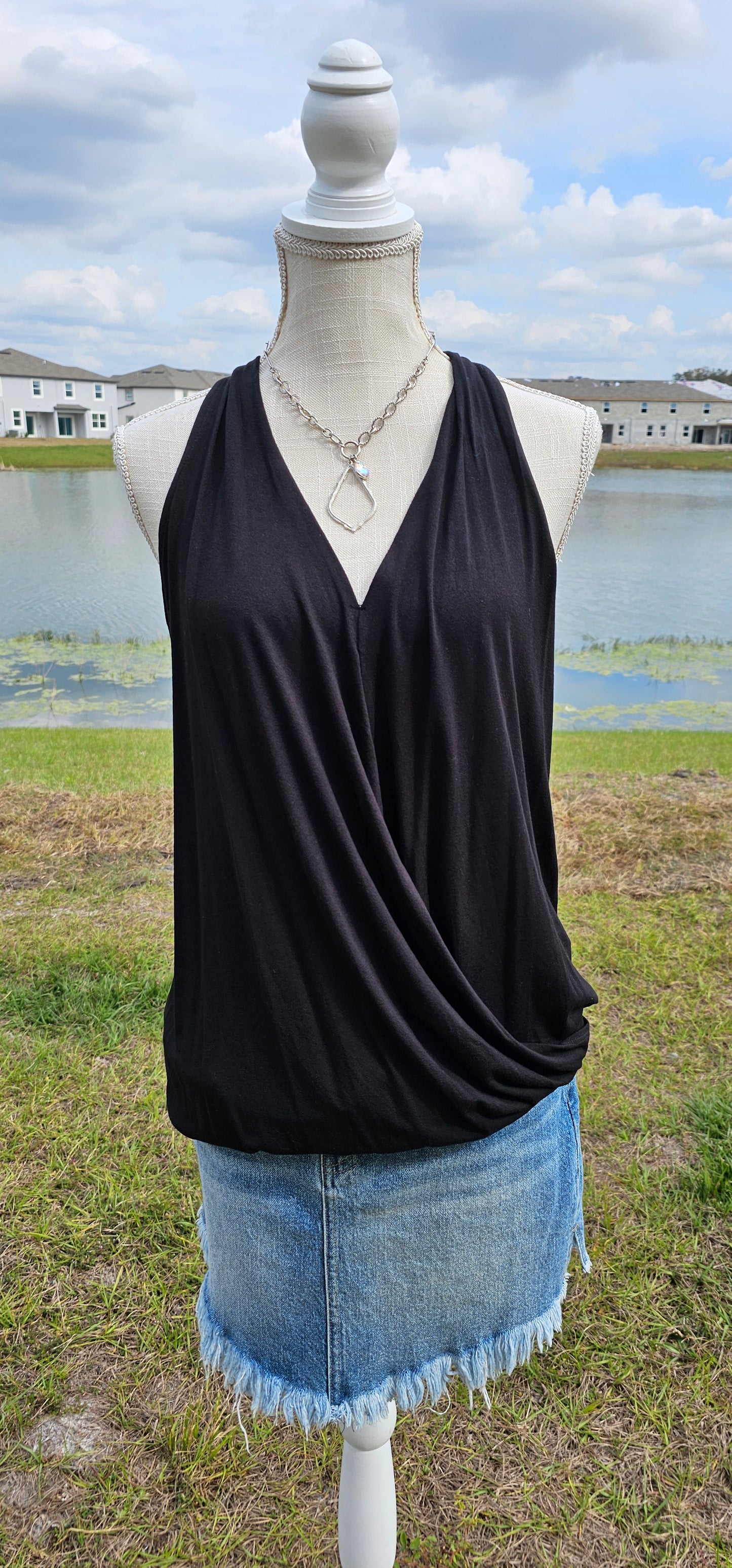 Rayon span crepe surplice halter top. Sizes small through x-large.