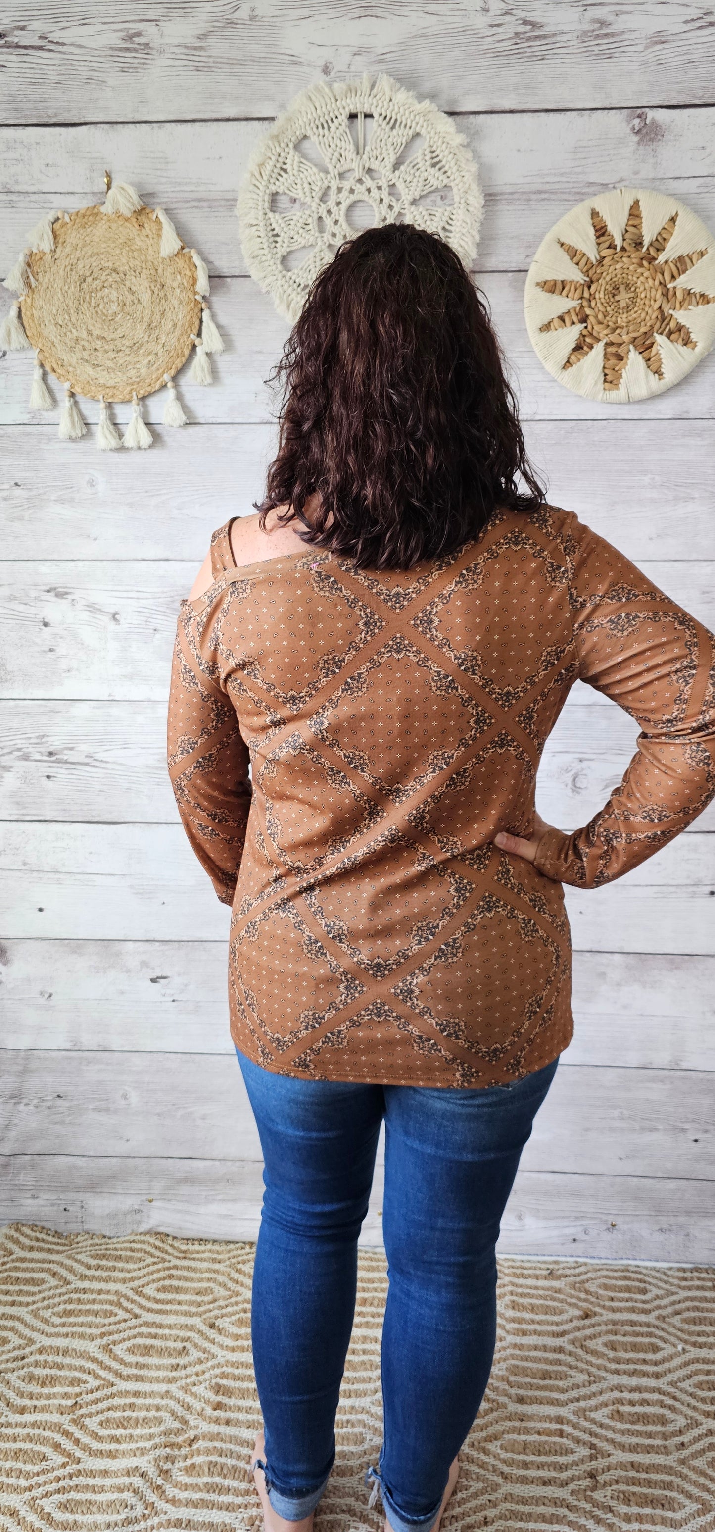 This top features one cold shoulder with strap, long sleeves, with bandana print. Light weight and breathable. Go ahead and wear it line dancing, to the rodeo, hanging out with your friends, or just running errands. You know that you want to give it a try! Sizes small through x-large.