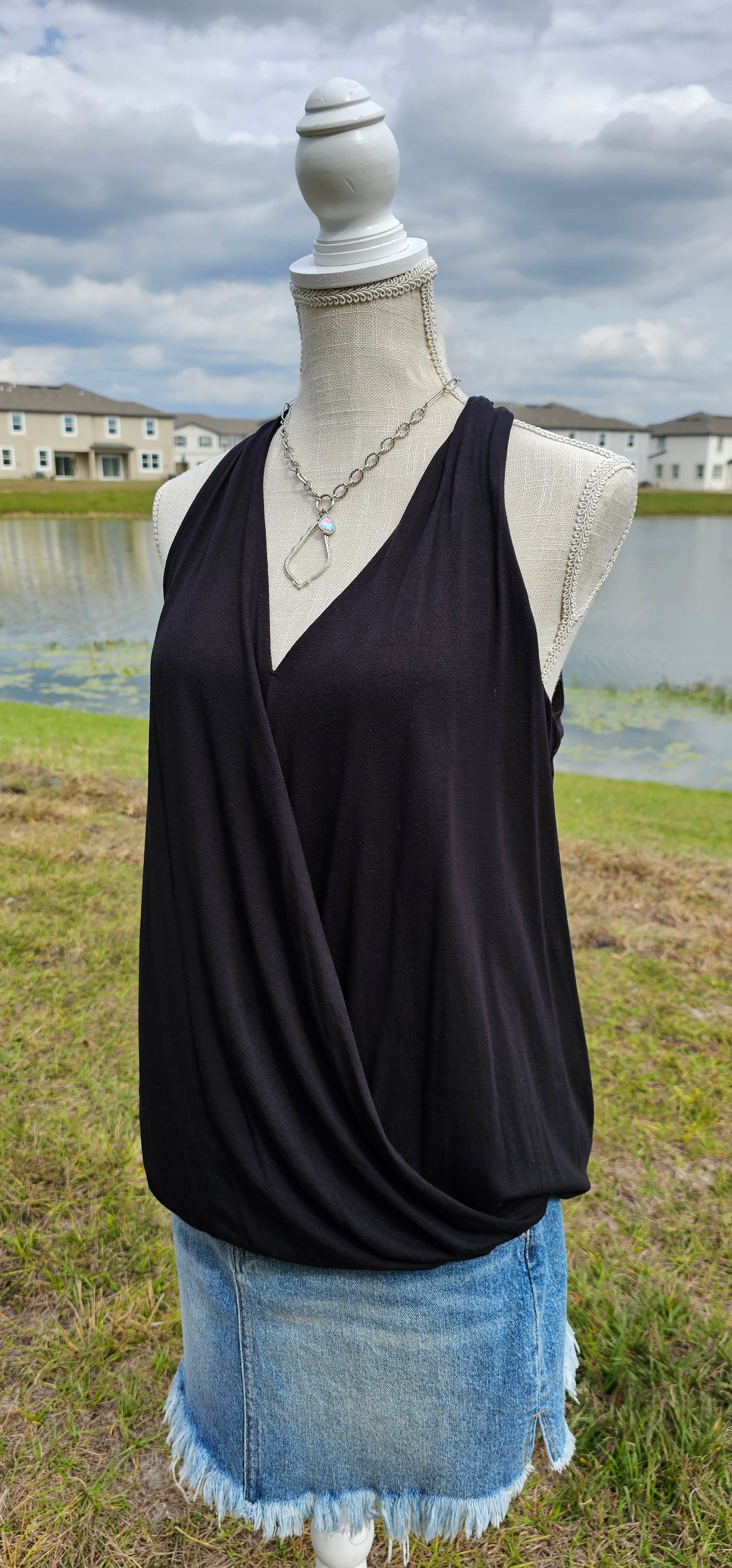 Rayon span crepe surplice halter top. Sizes small through x-large.