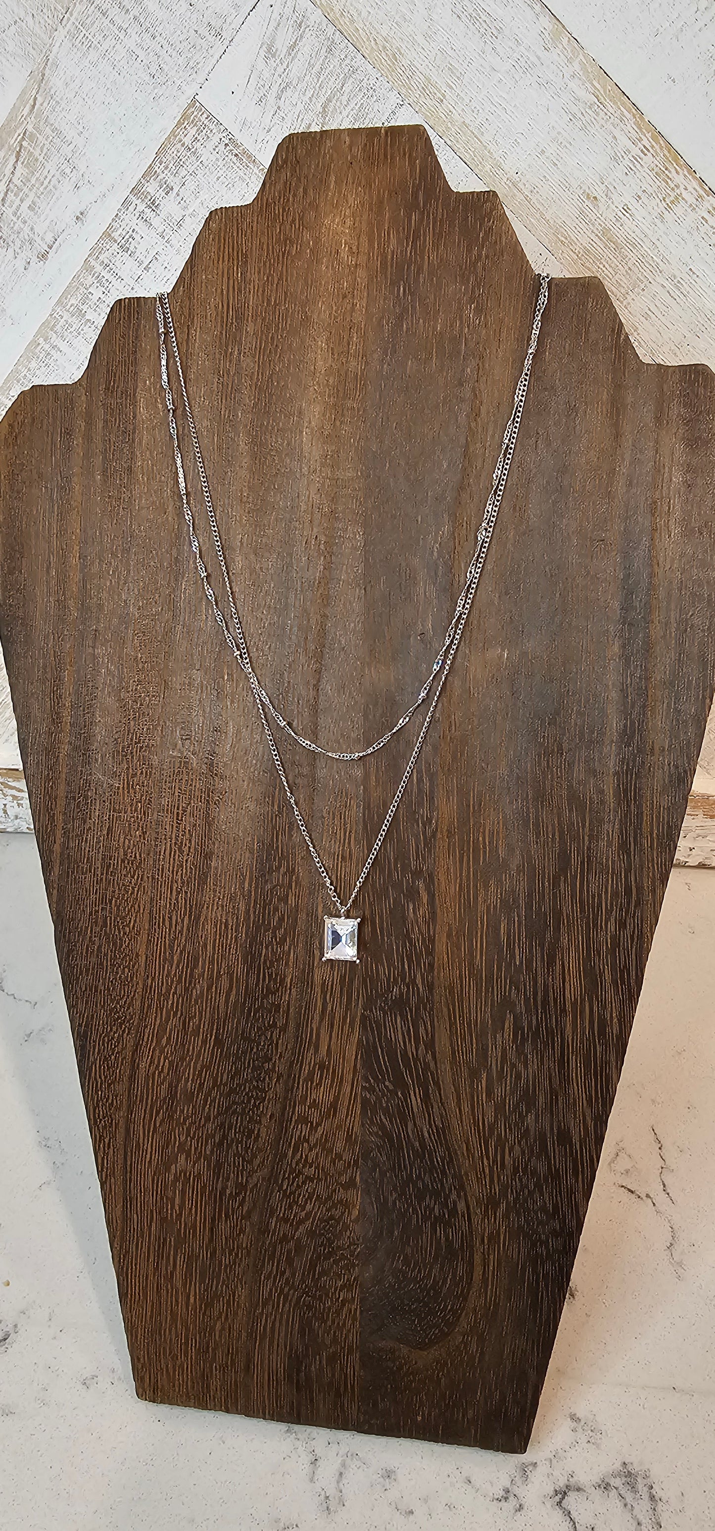 Approximate Length: Adjustable chain 16+2 inches Color: Silver link chain with silver beads and clear crystal Limited supply!