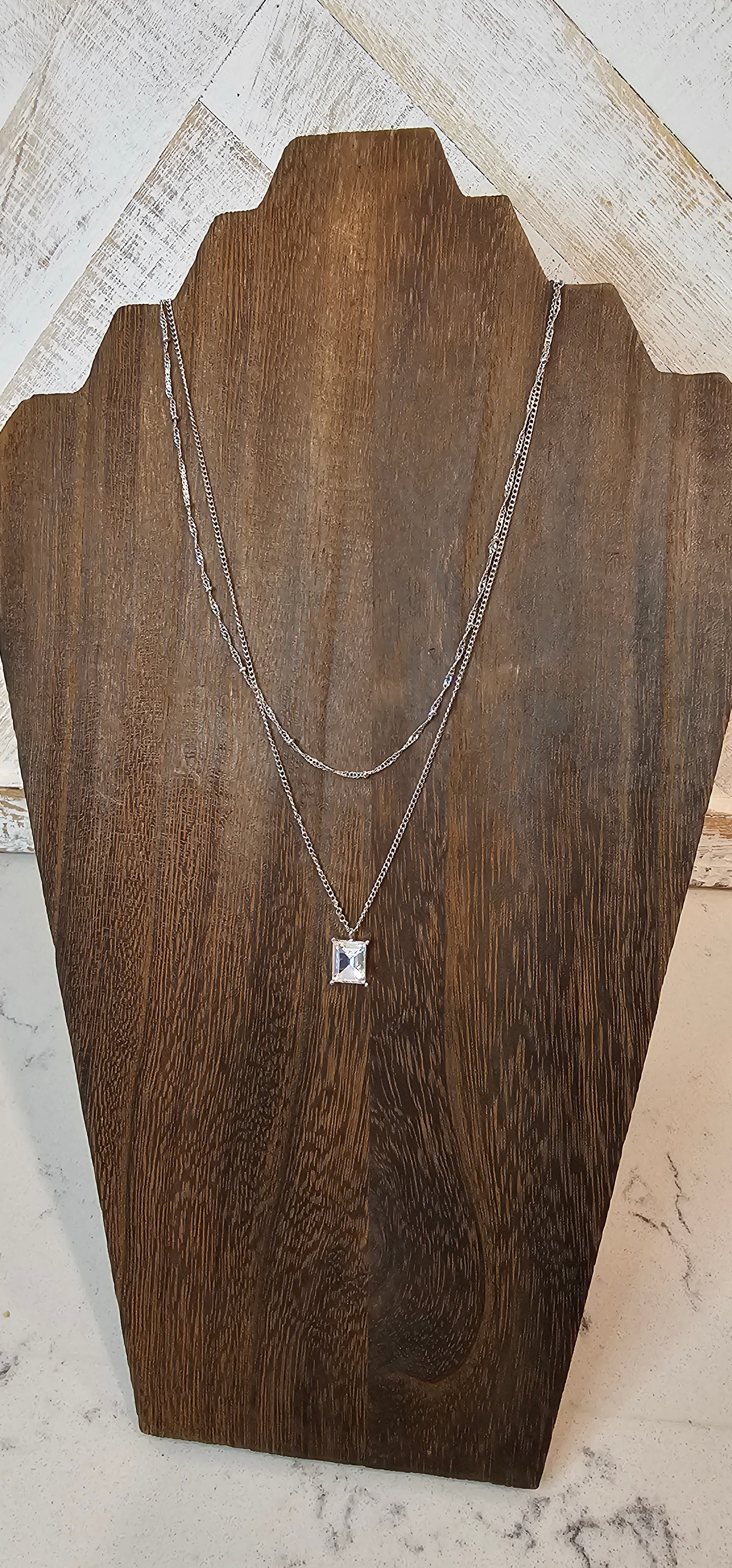 Approximate Length: Adjustable chain 16+2 inches Color: Silver link chain with silver beads and clear crystal Limited supply!