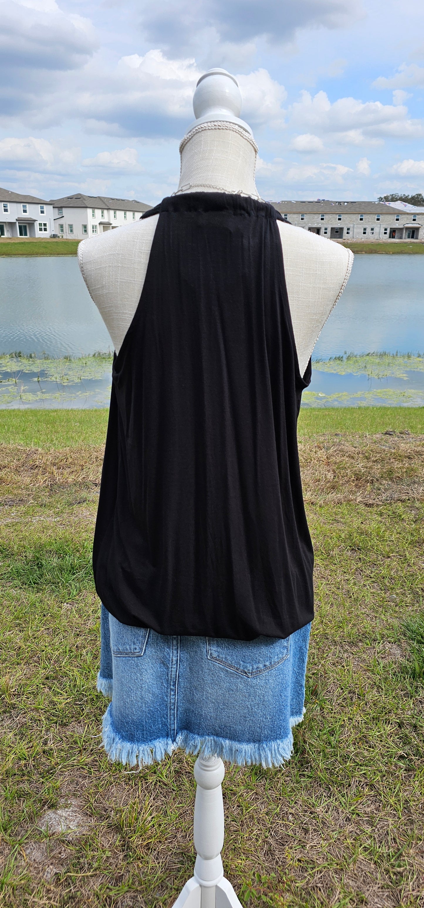 Rayon span crepe surplice halter top. Sizes small through x-large.