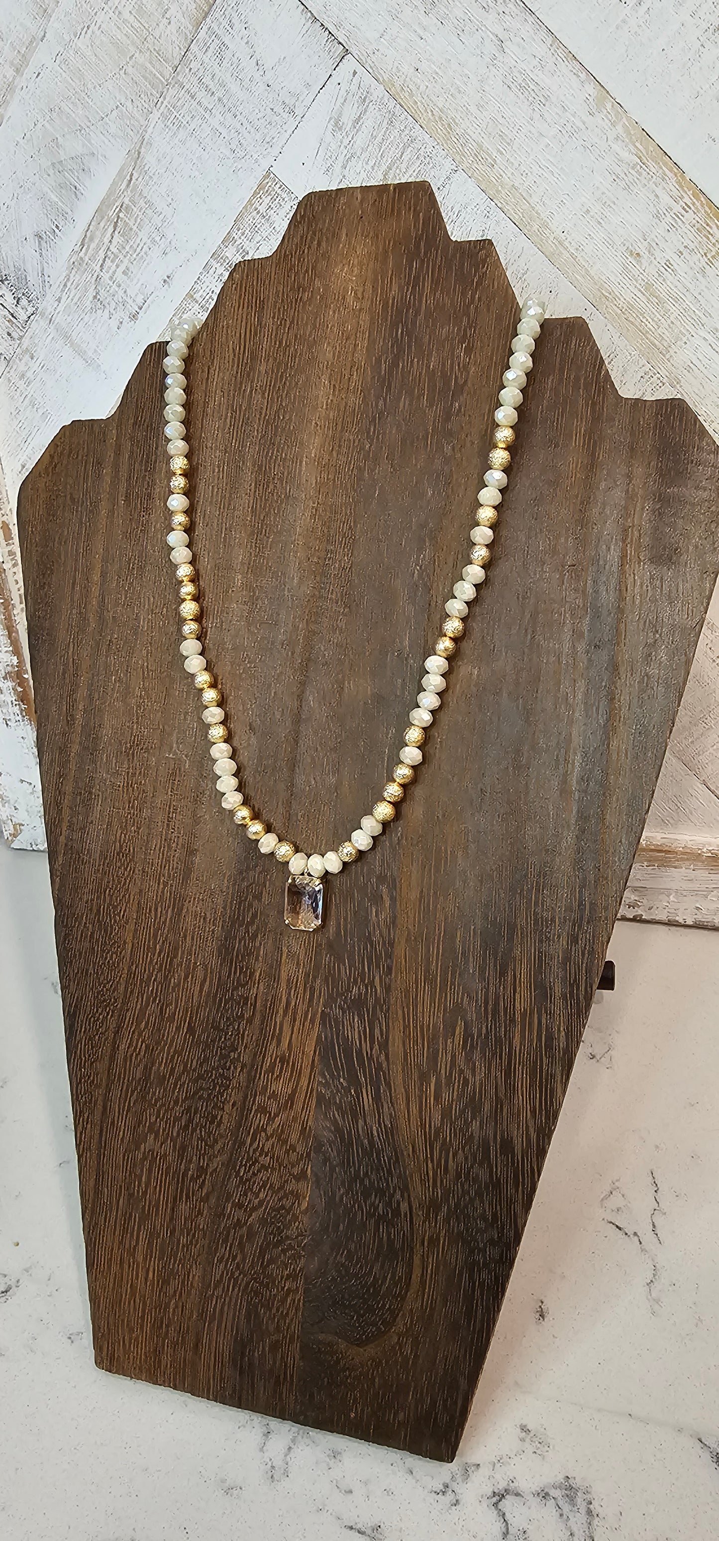 Adjustable chain Color: Gold link chains with ivory & gold beads, clear crystal Limited supply!