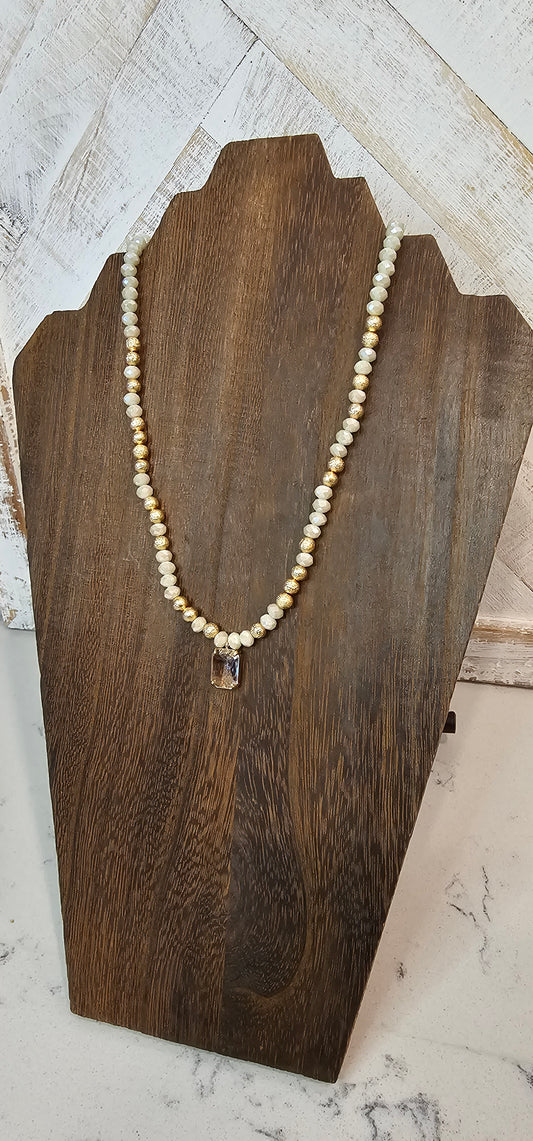 Adjustable chain Color: Gold link chains with ivory & gold beads, clear crystal Limited supply!