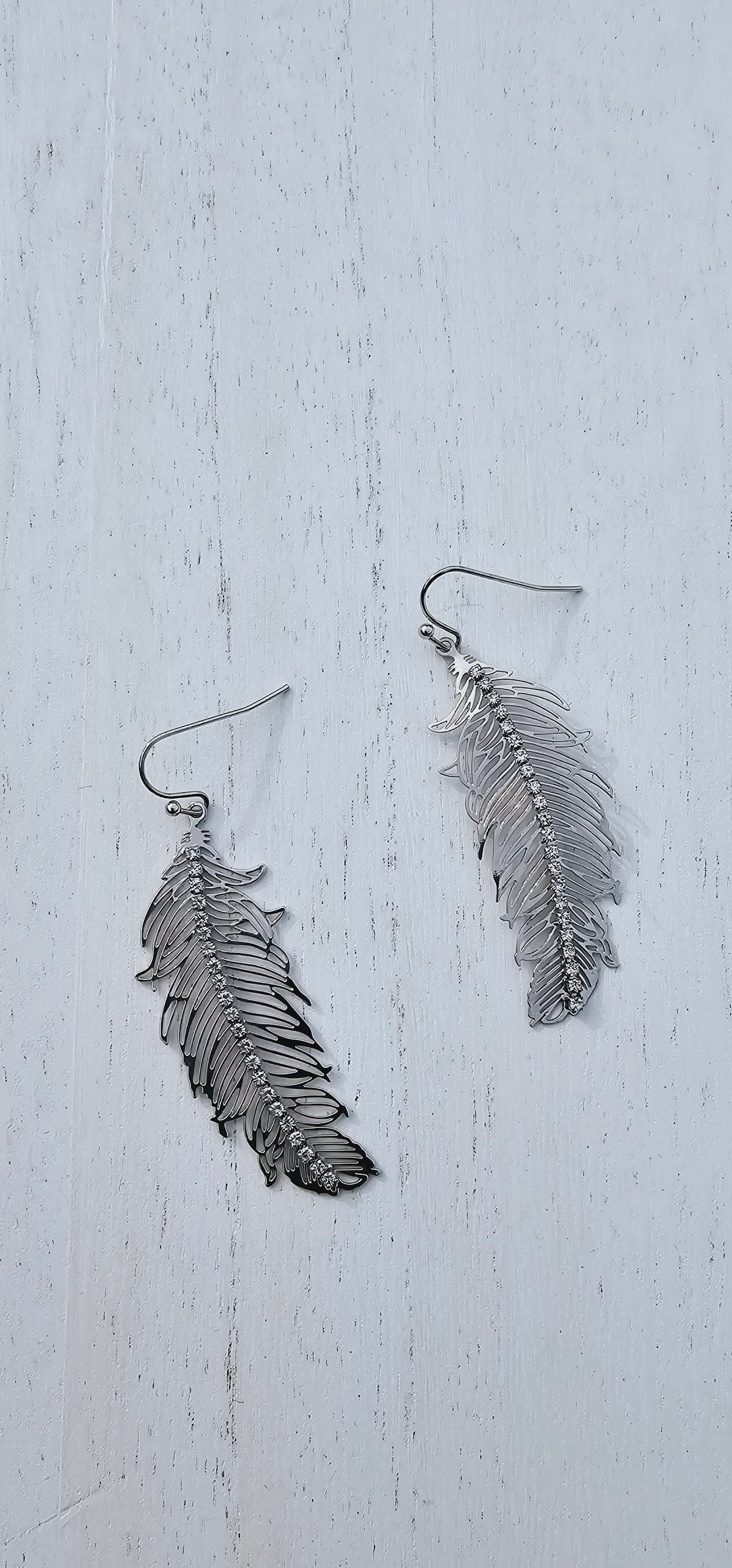 Silver feather fish hook earrings with rhinestones Limited supply!
