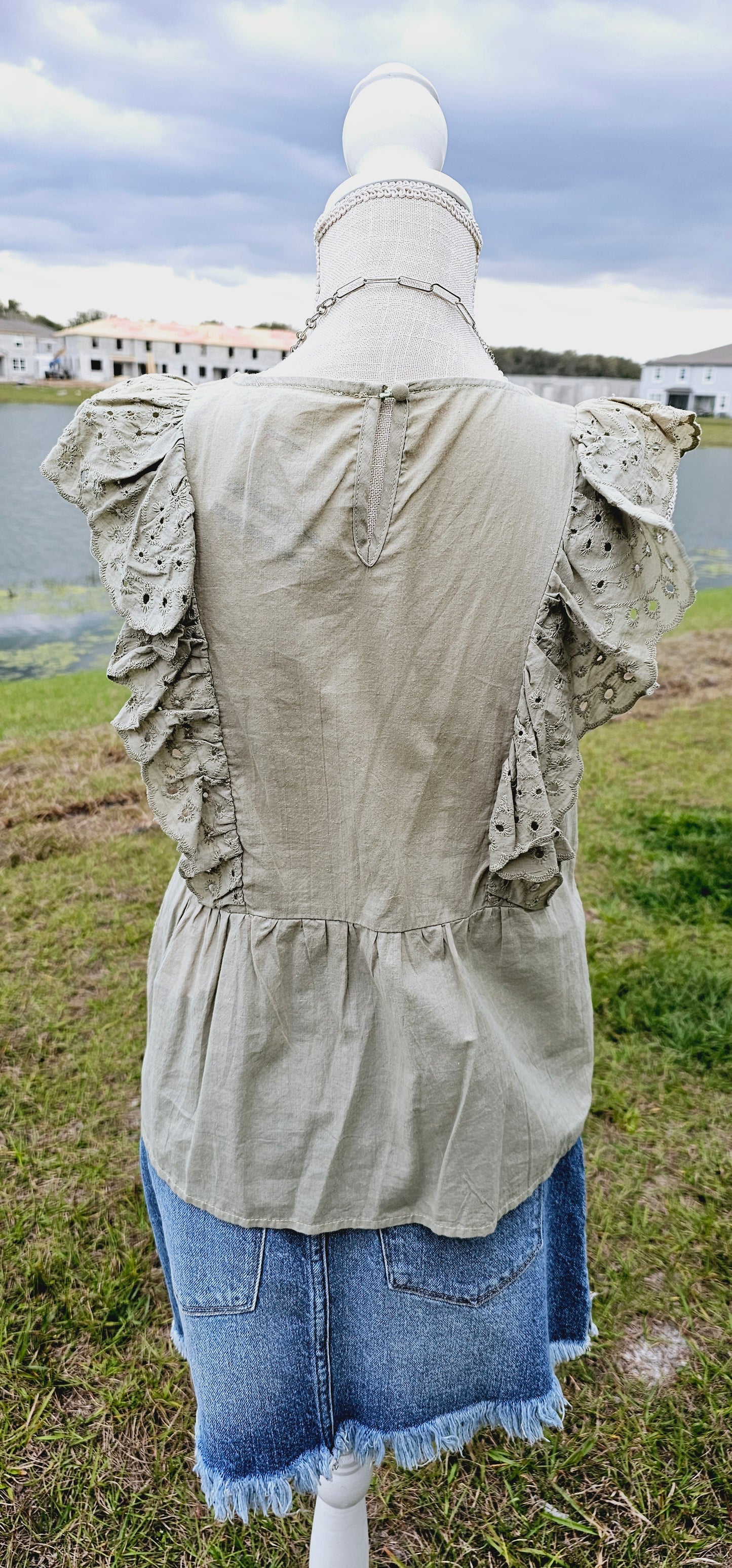 Shhh! Don’t tell anyone, but I like you! “Secret Crush” features ruffled lace trim short sleeves with eyelet design, scalloped hemline, keyhole back with button enclosure, and rounded neckline. This top is great for vacation, those hot summer days, or a shopping day with your friends. Sizes small through large.