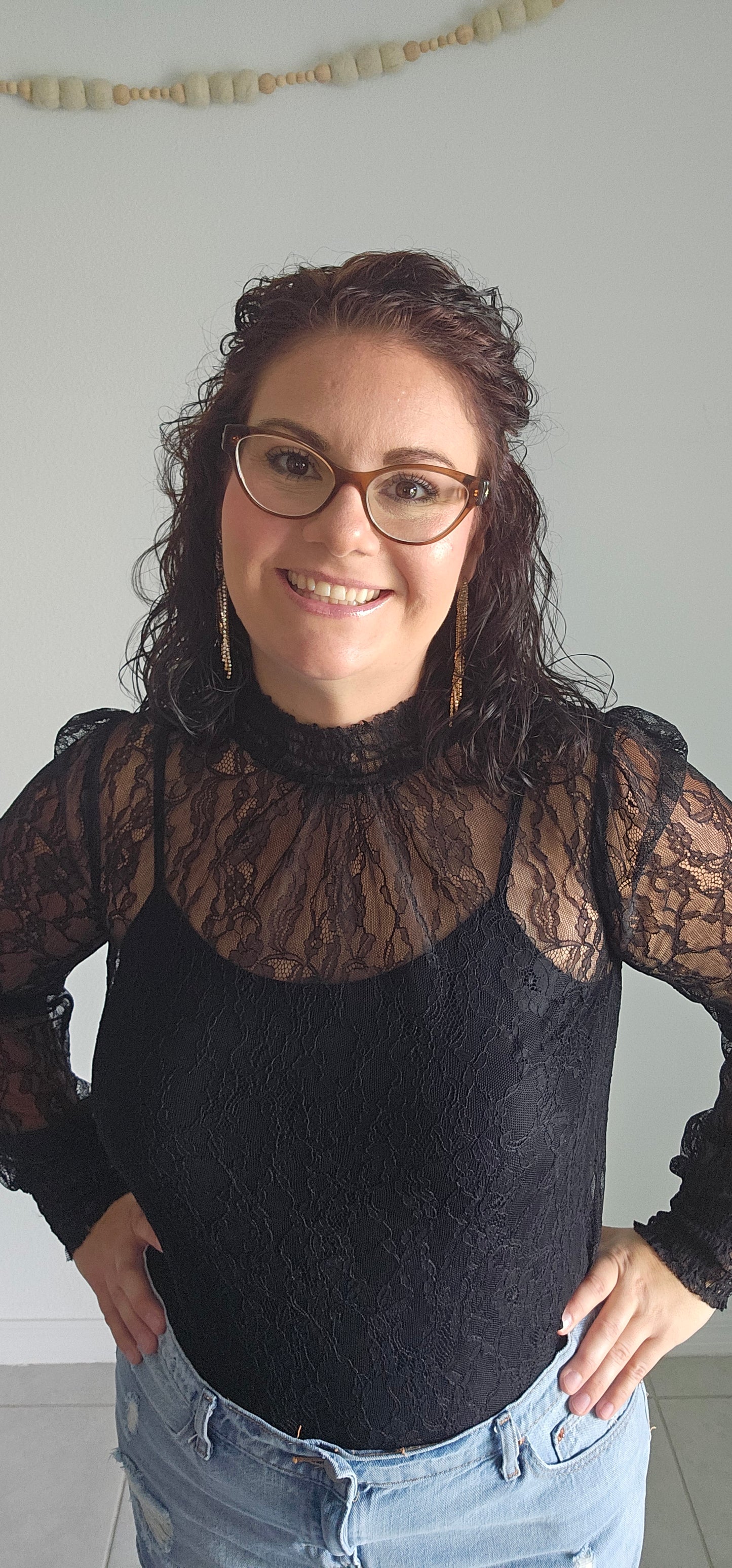Look luxe and fabulous in the "Lainey Black Mesh Lace Long Sleeve Top" - complete with a elastic mock neck, elastic cuffs, and a beautiful floral pattern! And if you're feeling extra daring, you can even pair it with a bodysuit for a sassy look sure to turn heads! Sizes small through large.