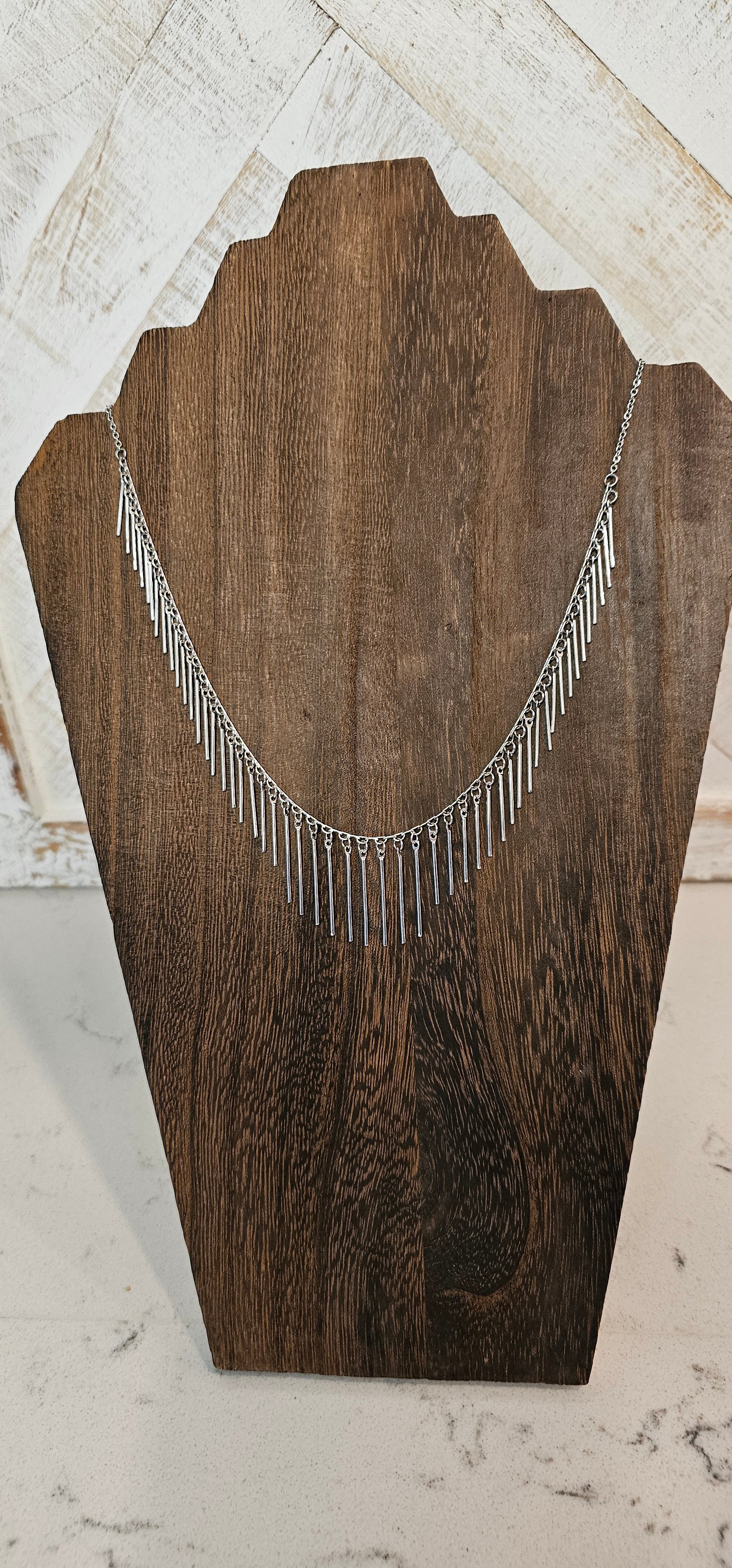 Approximate Length: Adjustable chain 16+2 inches Color: Silver link chain with silver fringe Limited supply!