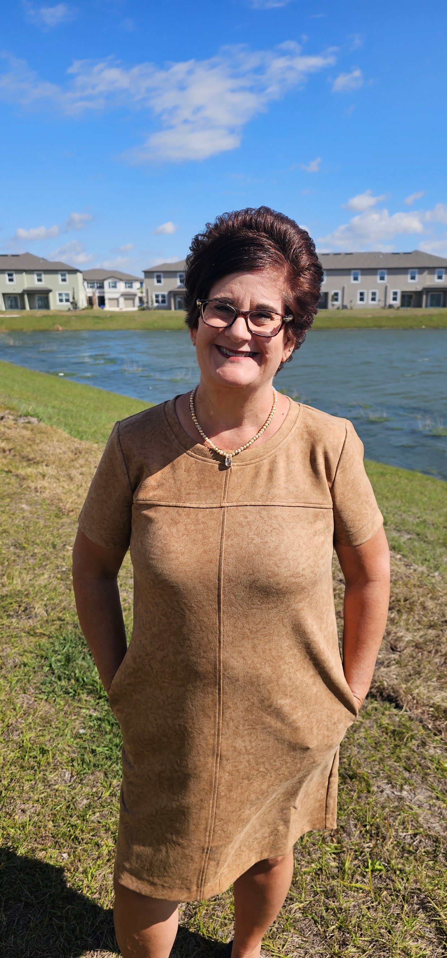 Dress to impress in this "Winona Mocha Printed Suede Shift Dress" and show off your country flair! With its round neckline, short sleeves, side pockets, and zipper back closure, it’s sure to be your go-to look for any special occasion. Yee-haw! Sizes small through large.