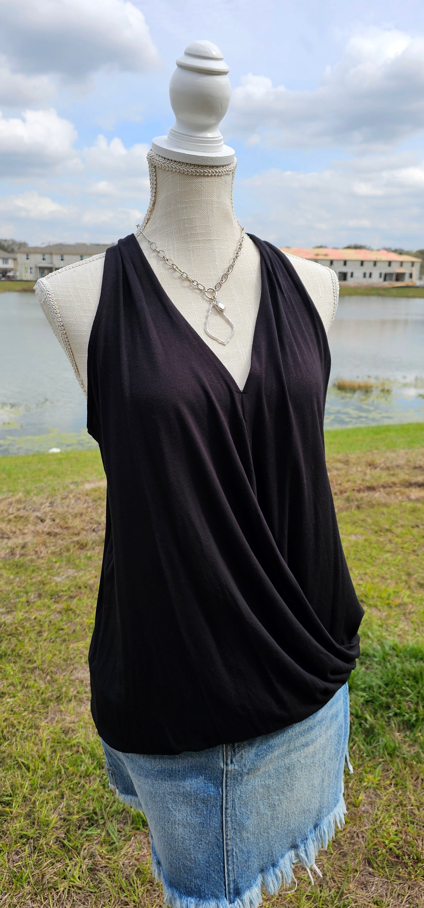 Rayon span crepe surplice halter top. Sizes small through x-large.