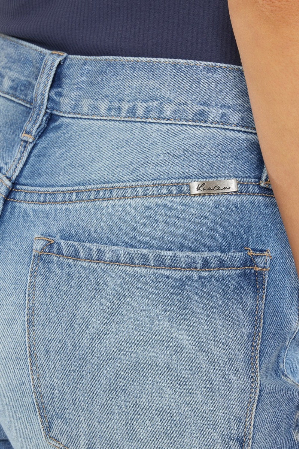 High Waist Chewed Up Straight Mom Jeans are the ultimate combination of vintage-inspired style and trendy edge. These jeans, with their high waistline, provide a flattering and comfortable fit that accentuates your curves.