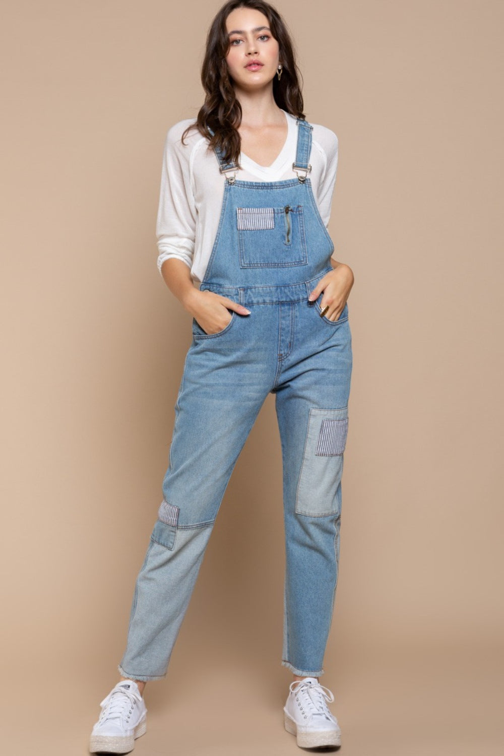 These Front Chest Zipper Slim Leg Denim Overalls are a stylish and modern addition to your wardrobe. The front chest zipper adds a unique and edgy touch to the classic overall design. With slim legs, these overalls provide a flattering silhouette and a sleek look. The denim fabric is durable and versatile, perfect for casual everyday wear. S - L