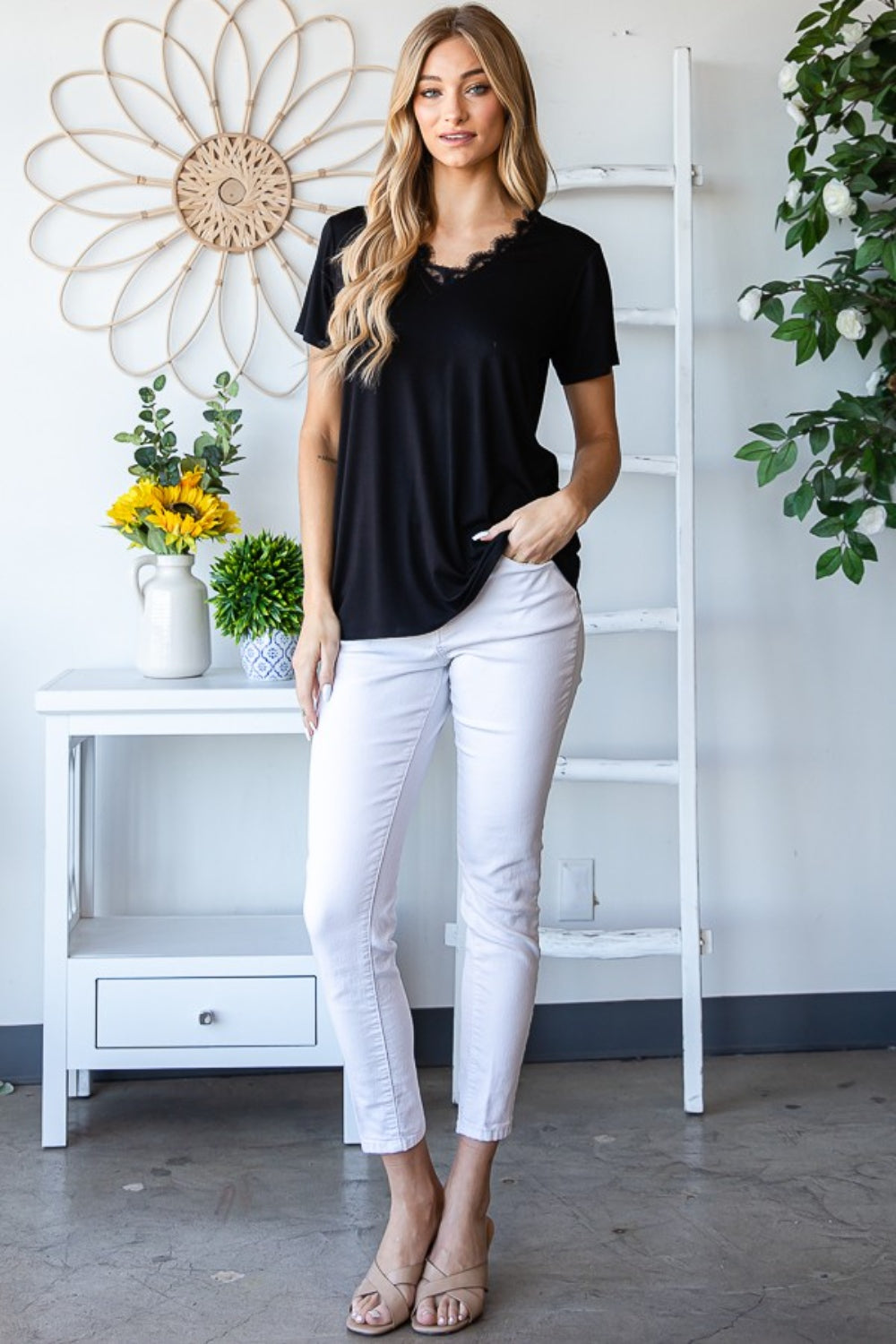 Lace Detail V-Neck Short Sleeve T-Shirt combines casual comfort with feminine elegance. The delicate lace detailing adds a touch of sophistication to the classic V-neck tee, making it perfect for both casual and dressier occasions. This shirt is a versatile and chic addition to any wardrobe, offering a stylish twist on a timeless silhouette. S-L