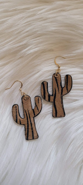 Zebra Cactus Earrings Cactus design Genuine leather Brown zebra print Gold fish hook Gold eyelet Rubber earring back Whether you want to be on the wild side or classy this earring set it will add a fun touch to your outfit