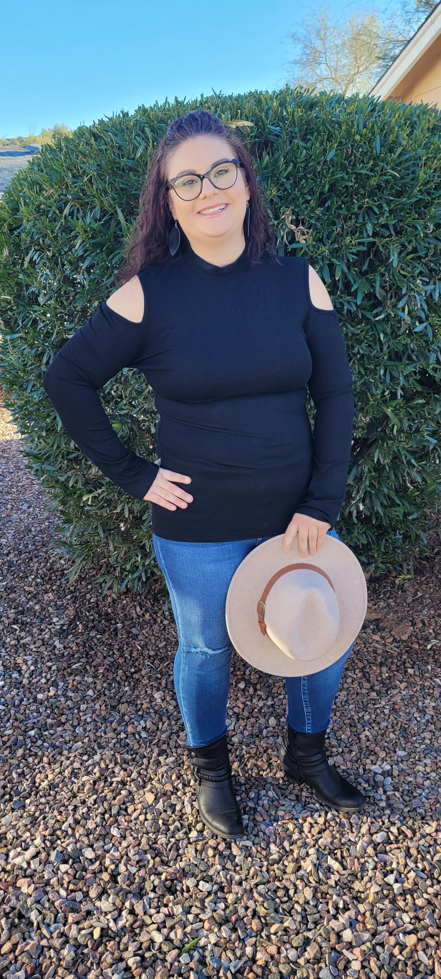 Imagine yourself in this cute staple piece. This top offers cold shoulders on both sides, ribbed material, and is light weight. Go ahead and be a little wild with this cutie! Show off your stuff! Sizes small through x-large.