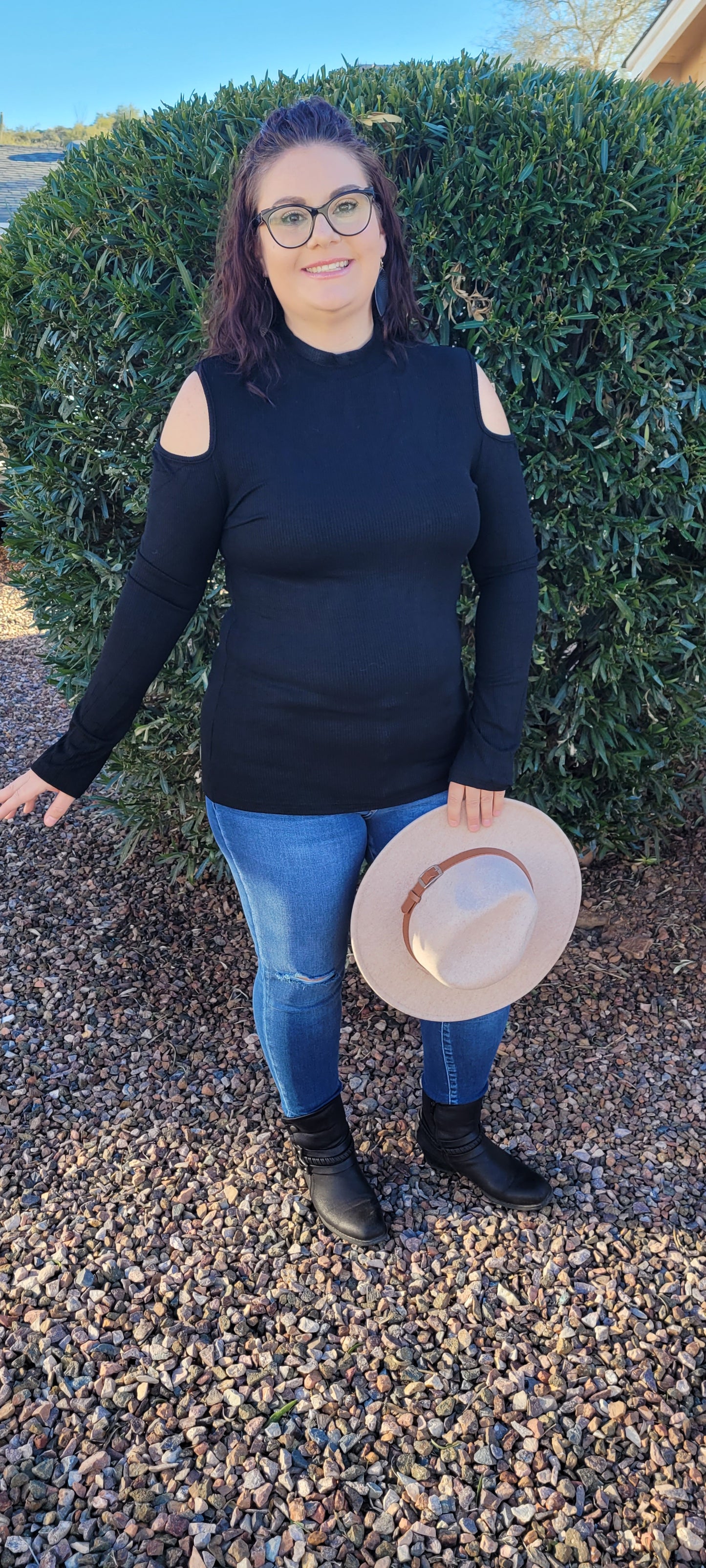 Imagine yourself in this cute staple piece. This top offers cold shoulders on both sides, ribbed material, and is light weight. Go ahead and be a little wild with this cutie! Show off your stuff! Sizes small through x-large.