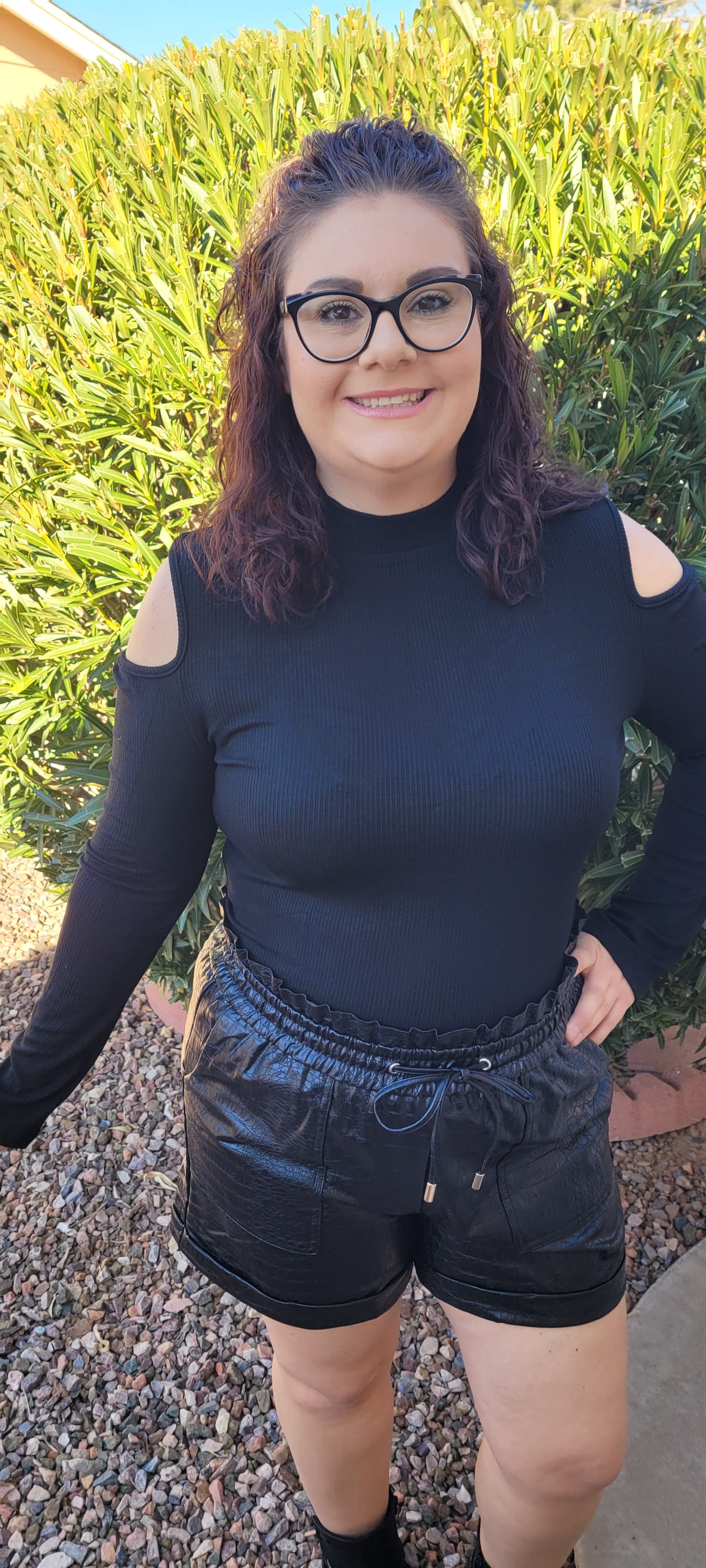 Imagine yourself in this cute staple piece. This top offers cold shoulders on both sides, ribbed material, and is light weight. Go ahead and be a little wild with this cutie! Show off your stuff! Sizes small through x-large.