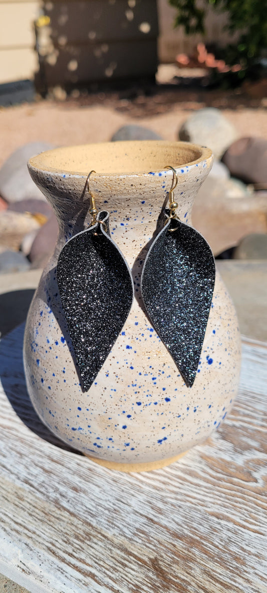 Black glitter Inverted teardrop shape Brushed gold fish hook dangle earrings Rubber earring back Whether you want to be on the wild side or classy this earring set it will add a fun touch to your outfit