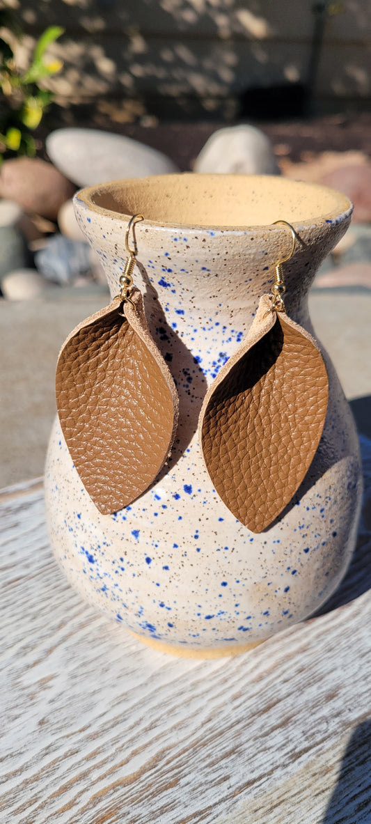 Teardrop shape Brown genuine leather Shiny brown Brushed gold fish hook dangle earrings Rubber earring back Whether you want to be on the wild side or classy this earring set it will add a fun touch to your outfit