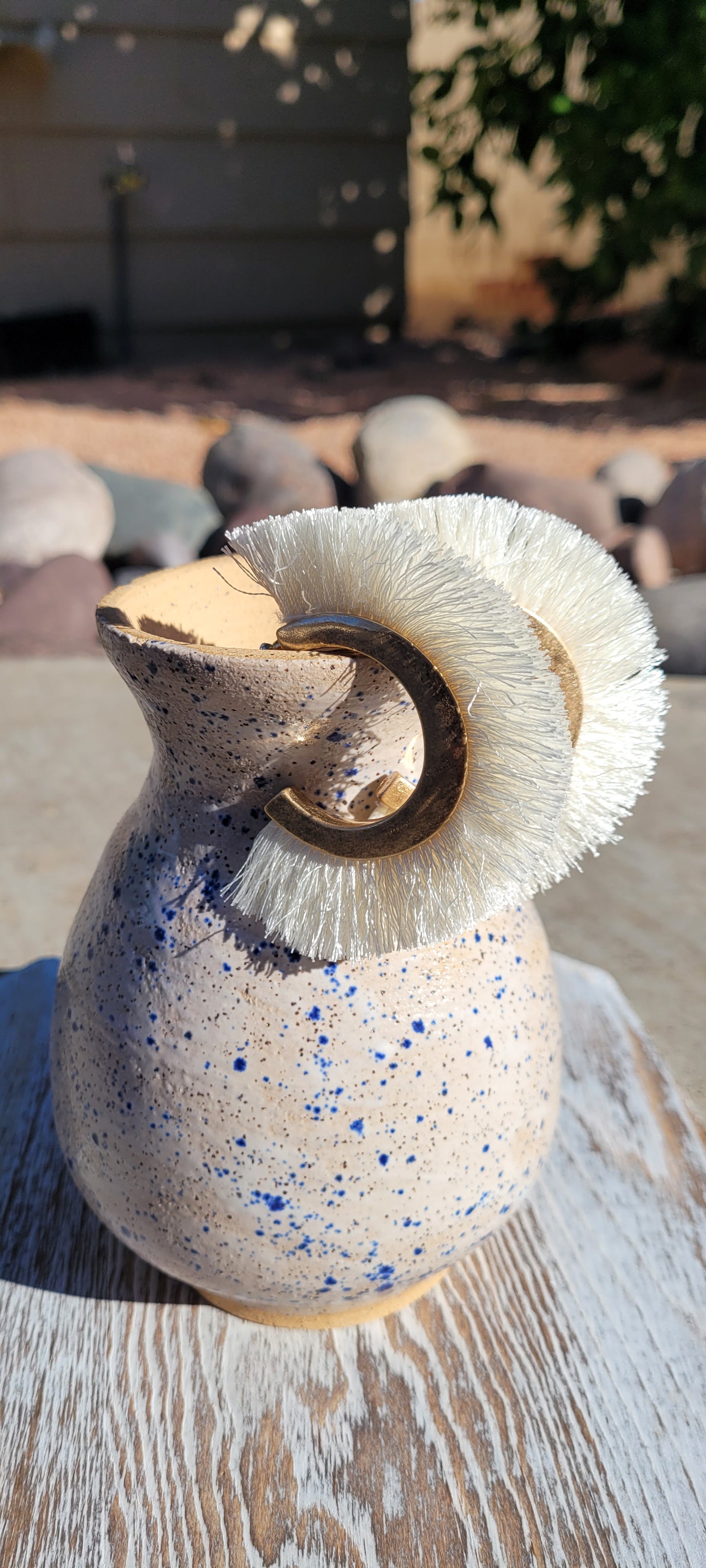 Ivory tassels Brushed gold hoops Brushed gold stud earrings Metal earring back Diameter 3” Whether you want to be on the wild side or classy this earring set it will add a fun touch to your outfit